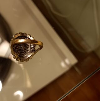 Anillo plateado con cristal azul