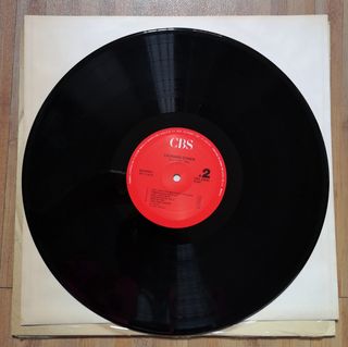 Disco vinilo Leonard Cohen - Greatest Hits y otro.