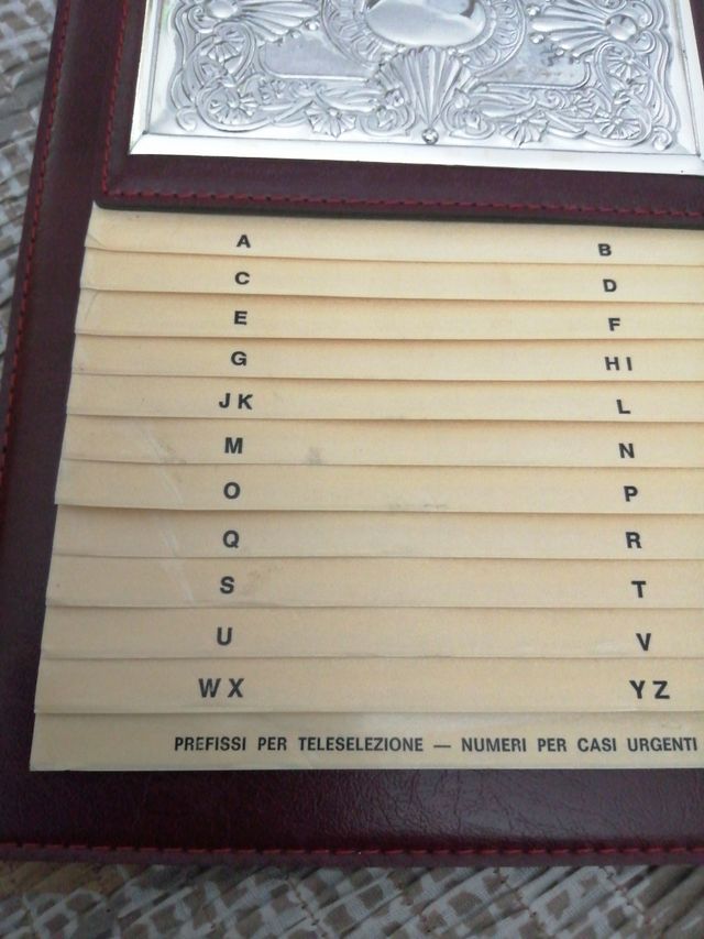 Rubrica con inserto argento