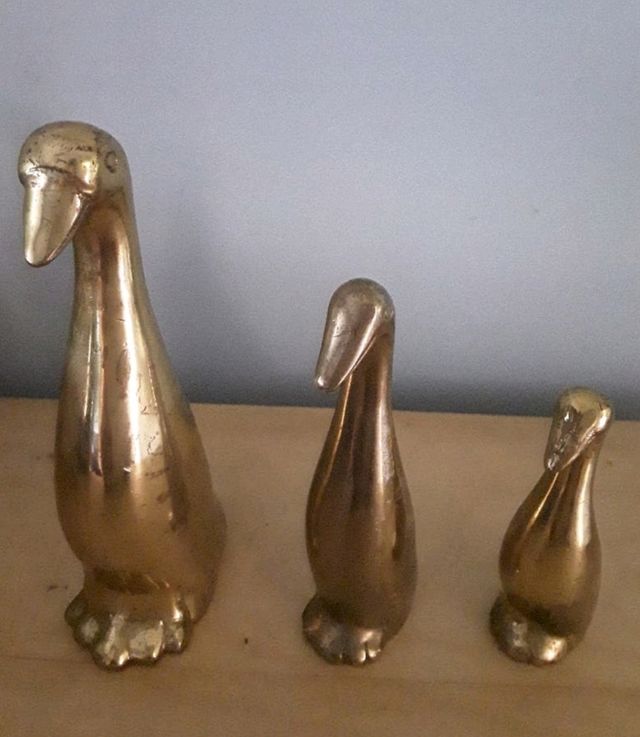 Patos de bronce vintage