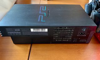 PlayStation 2 con 12 videogiochi e 2 joystick