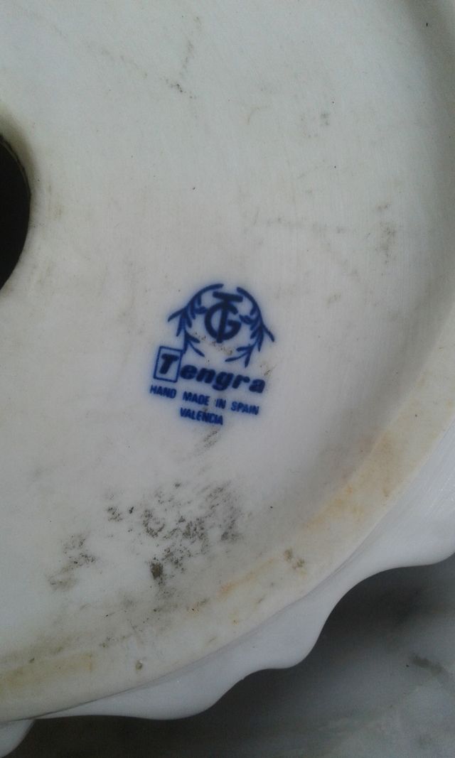 Lámpara de aceite y figura