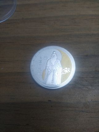 Moneda Yin y Yan 