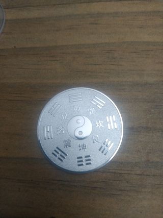 Moneda Yin y Yan 