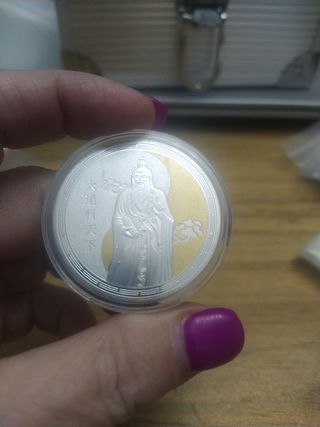 Moneda Yin y Yan 