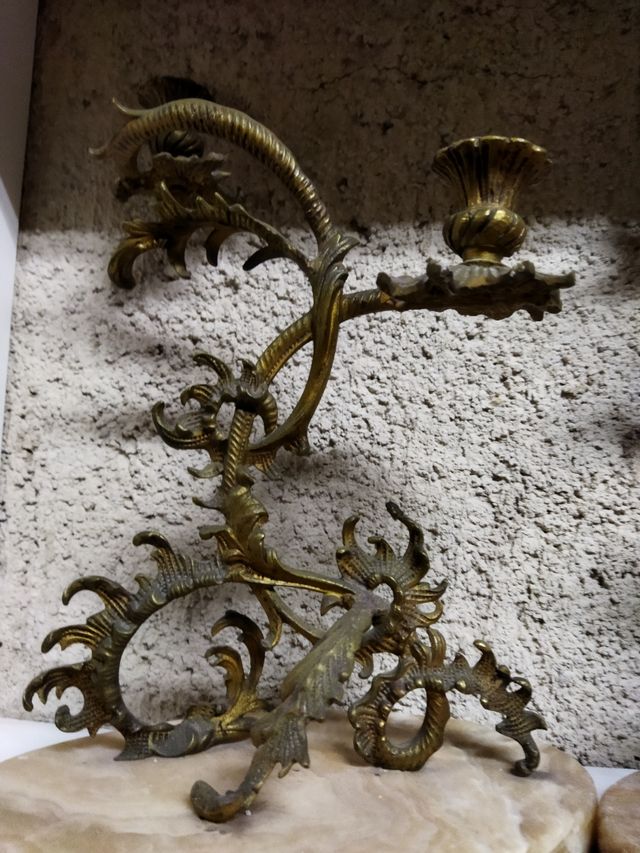antiguo lo reloj y.candelabros de bronce