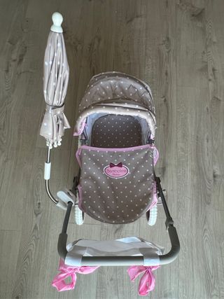 Cochecito muñecas.