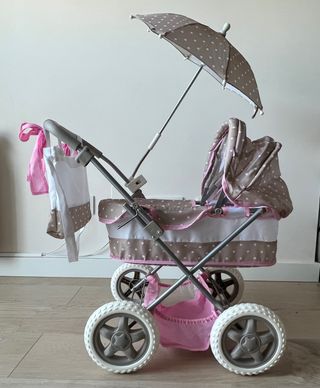 Cochecito muñecas.
