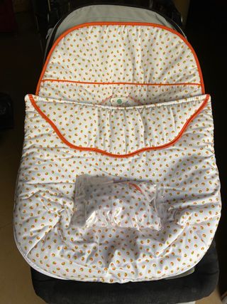 Funda de silla Maxi-Cosi.