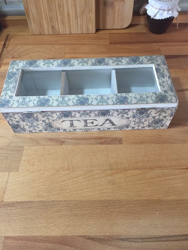 Caja té