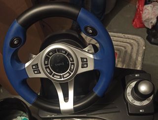 Play 3, 3 mandos, volante y 15 juegos