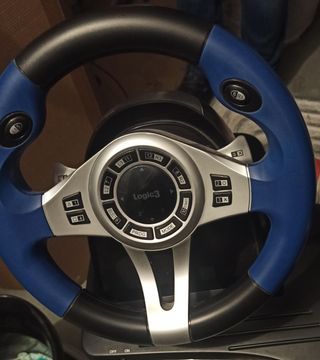 Play 3, 3 mandos, volante y 15 juegos