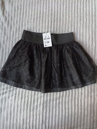 Minifalda negra de Blanco.