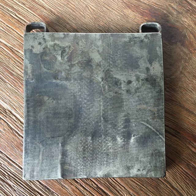 Ciondolo in tessuto peruviano e anello/metallo