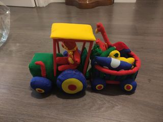 Tractor o camion Tela animales colores