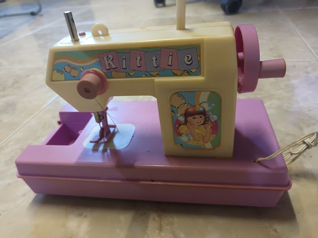 Máquina de coser de juguete