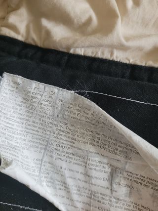 Mochila Ergobaby con reductor.