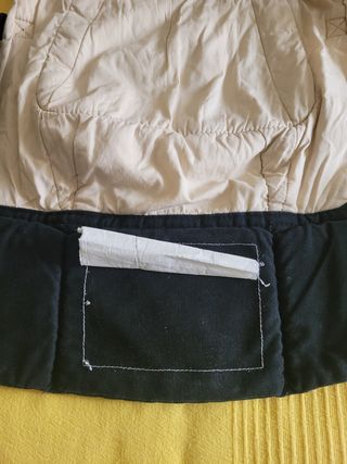 Mochila Ergobaby con reductor.