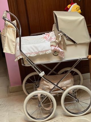 Muñeco Reborn y carro capota 