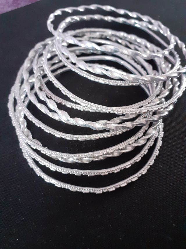 12 bracciali in acciaio nuovi