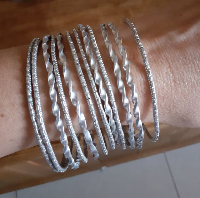 12 bracciali in acciaio nuovi