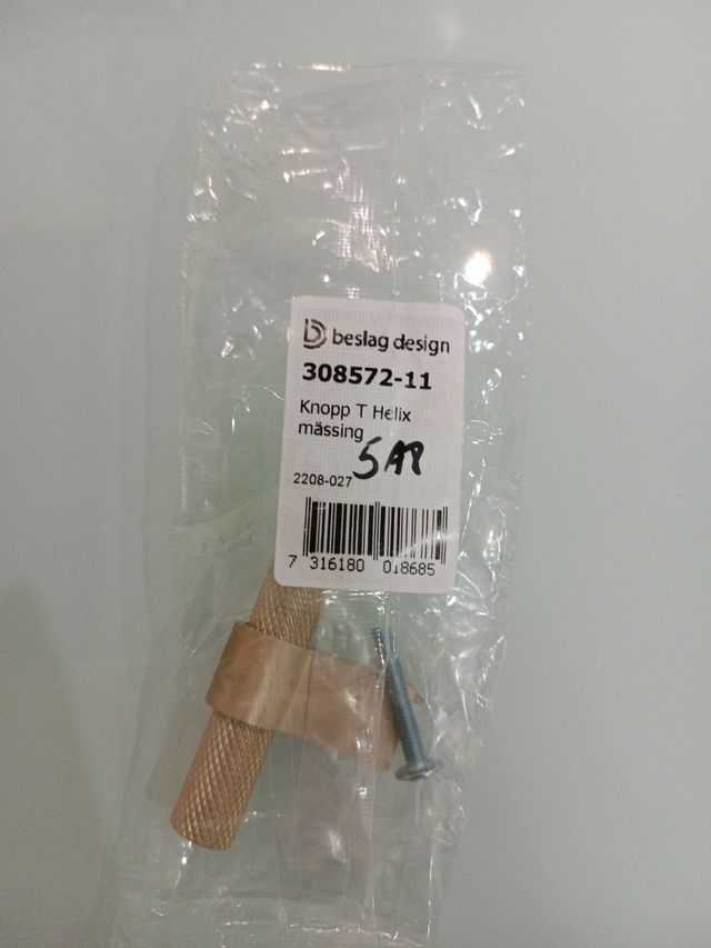 Tirador en forma de T