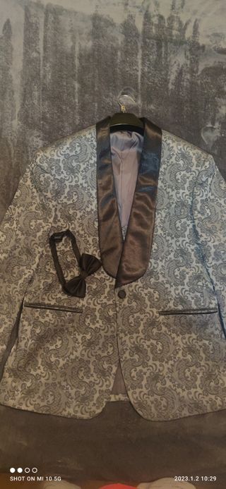 chaqueta,chaleco y pajarita