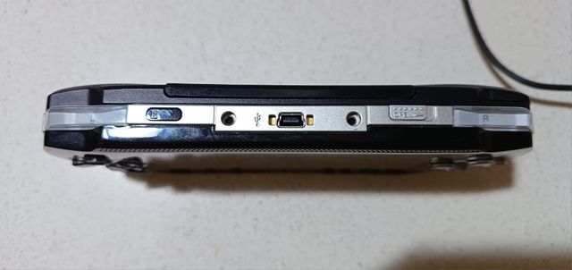 psp con cargador y batería nueva