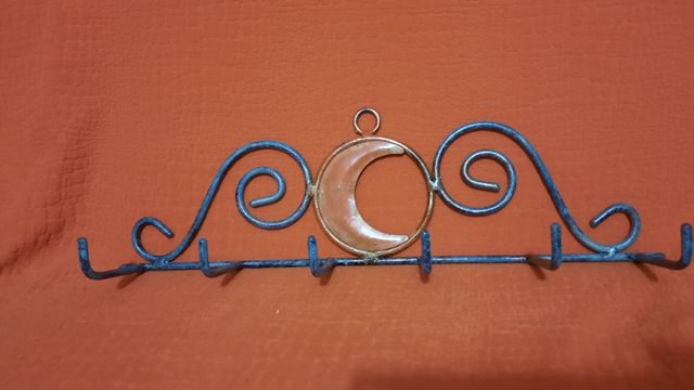 Appendino in ferro battuto