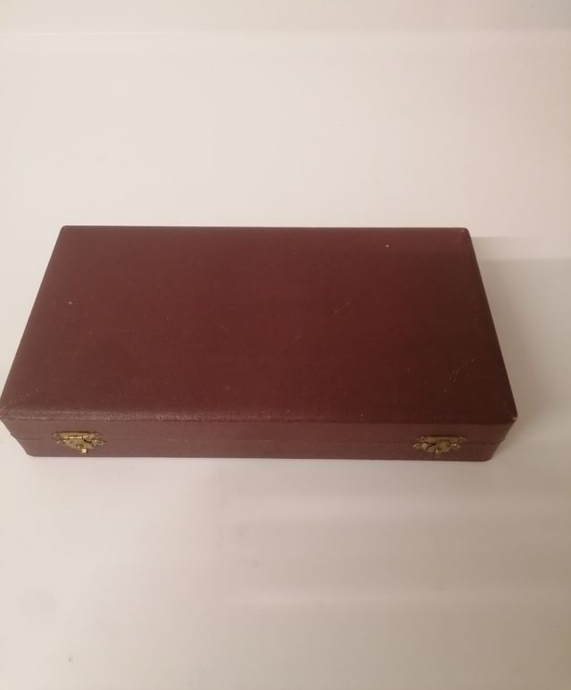 Tres cubiertos de alpaca.