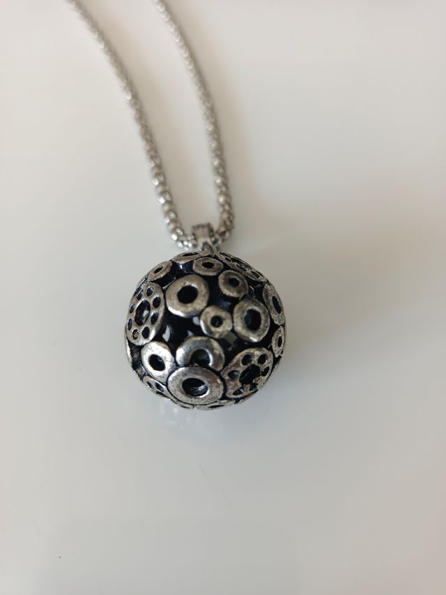 Conjunto de pendientes, pulseras y colgante