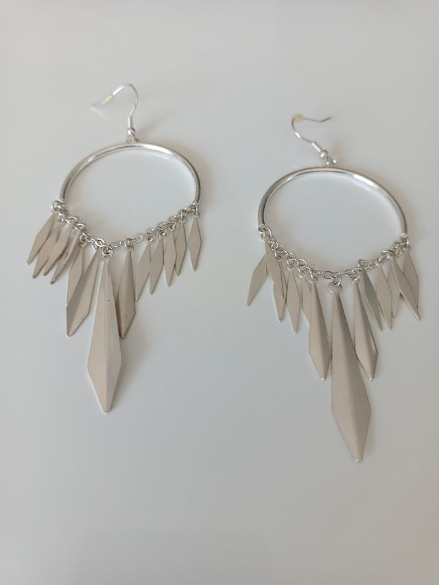 Conjunto de pendientes, pulseras y colgante