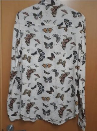 blusa blanca mariposas a estrenar