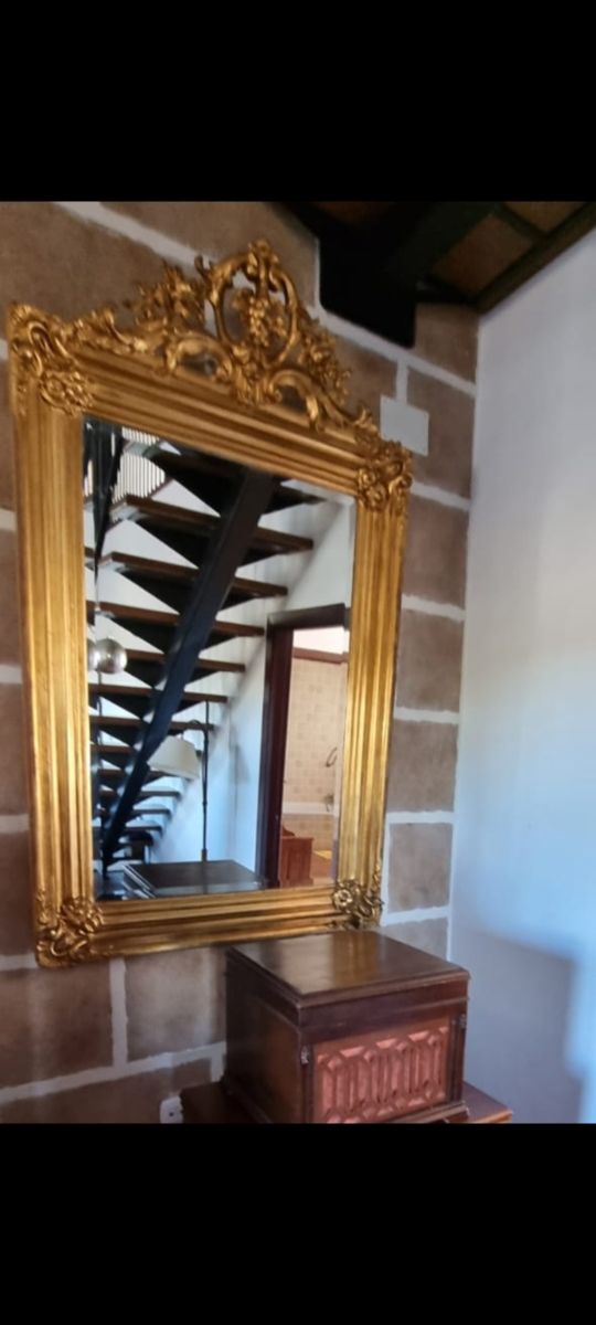 Espejo artesanal restaurado bañado en pan de oro