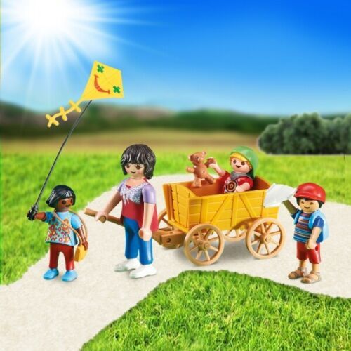 playmobil cuidadora con niños y carro precintada