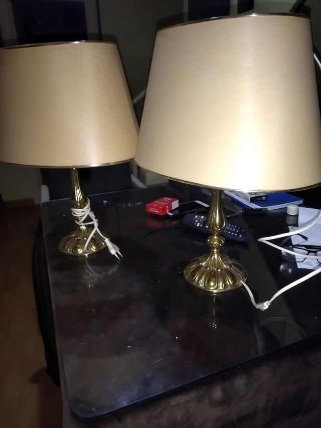 vecchia coppia di lampade in bronzo