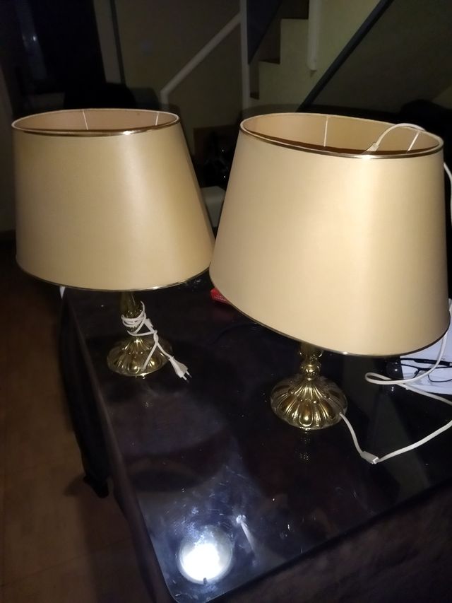 vecchia coppia di lampade in bronzo