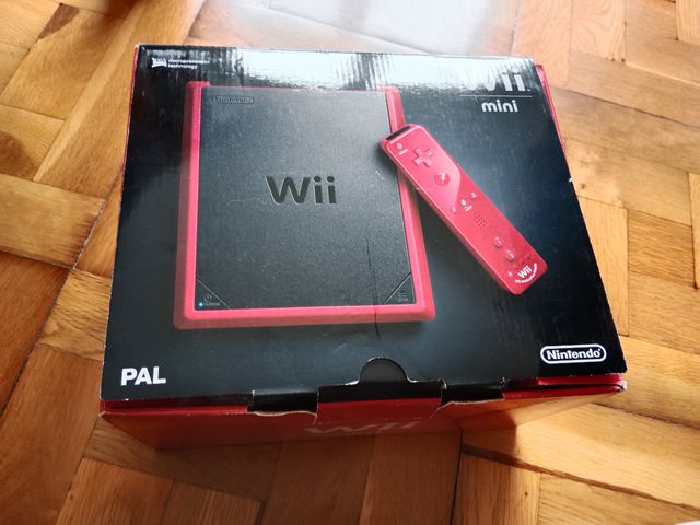 Wii mini + Wii fit juego+ Base