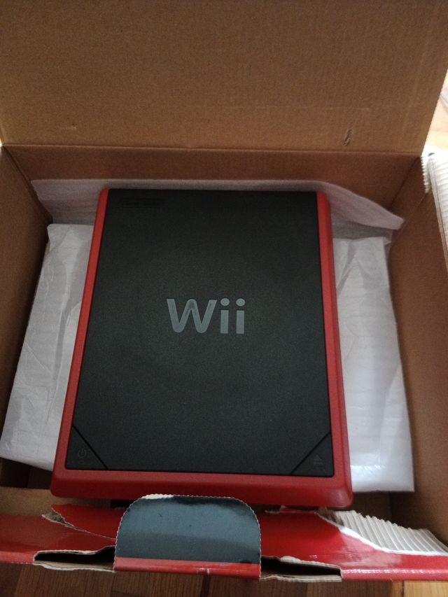 Wii mini + Wii fit juego+ Base