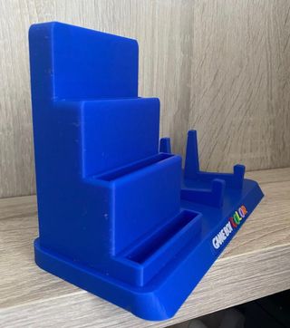 Soporte game boy color + 4 porta juegos