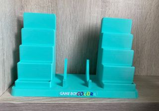 Soporte game boy color + 10 porta juegos