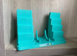 Soporte game boy color + 10 porta juegos