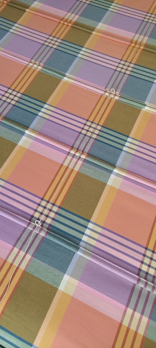 Estor plegable con varillas