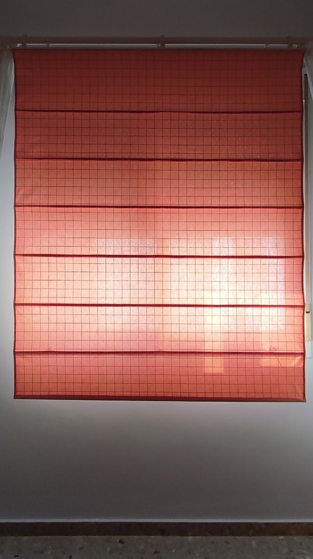 Estor plegable con varillas