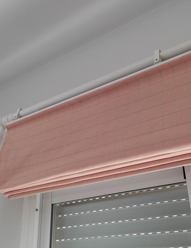 Estor plegable con varillas