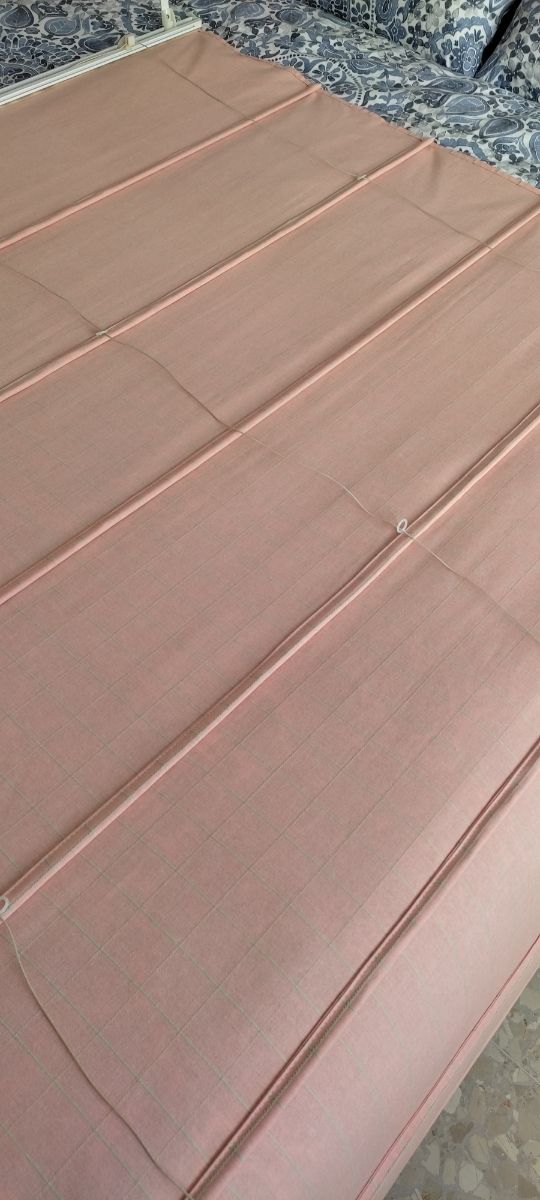 Estor plegable con varillas