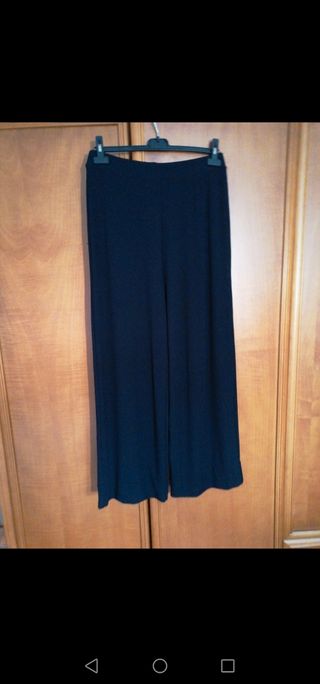 pantalón *Zara*
