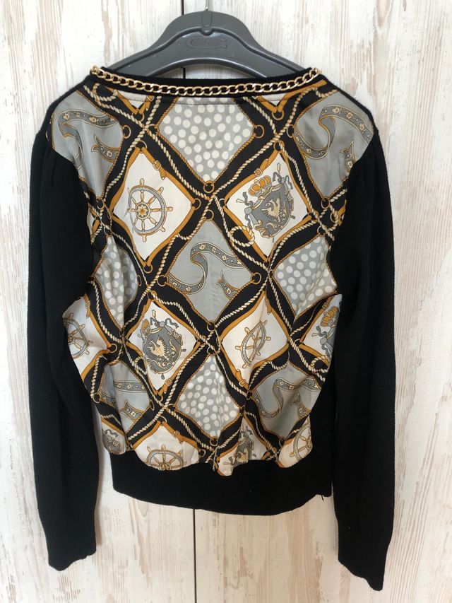 Chaqueta punto negra con espalda de tela estam