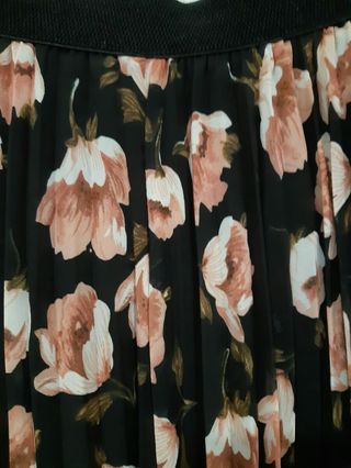 Falda plisada y tobillera. Talla unica