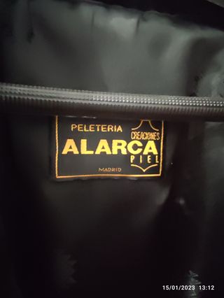 Abrigo negro Mouton